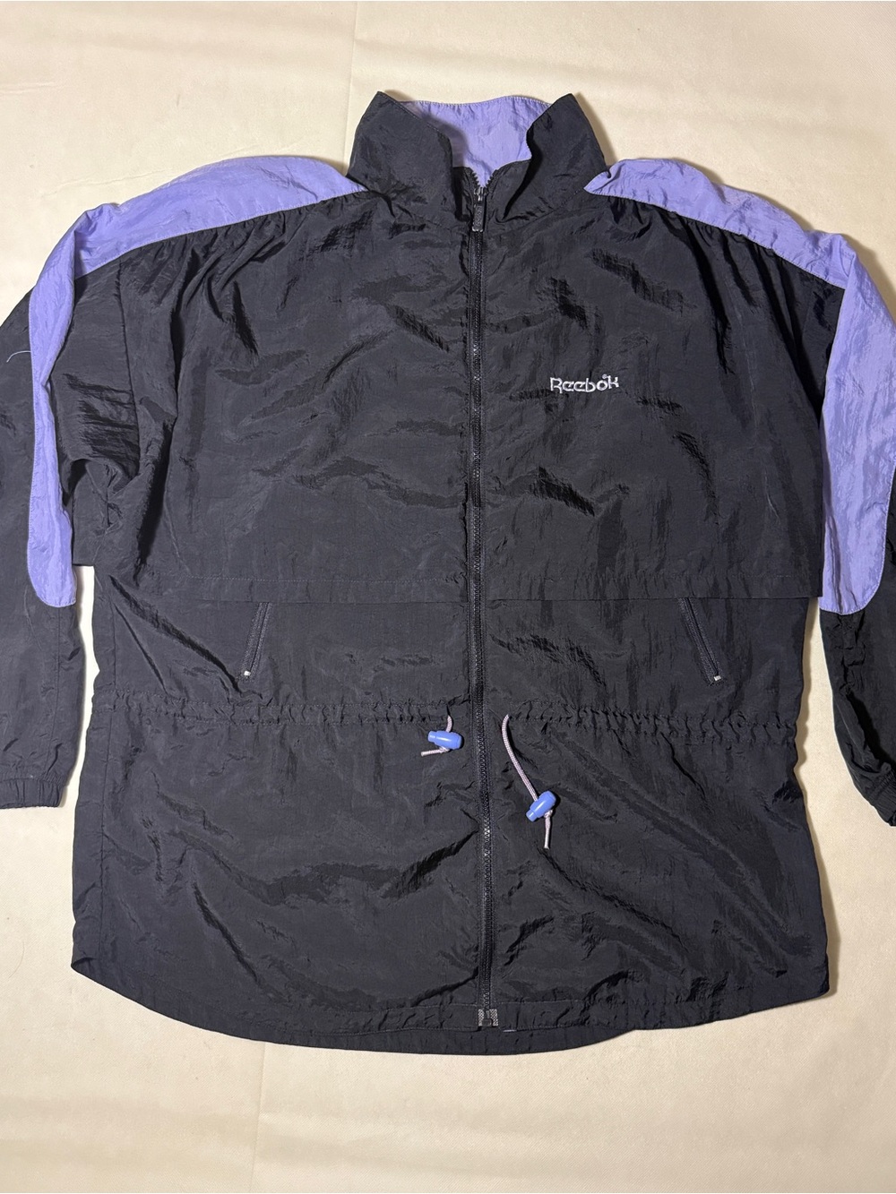Vintage Reebok Men’s Black Windbreaker with Lavender Accents